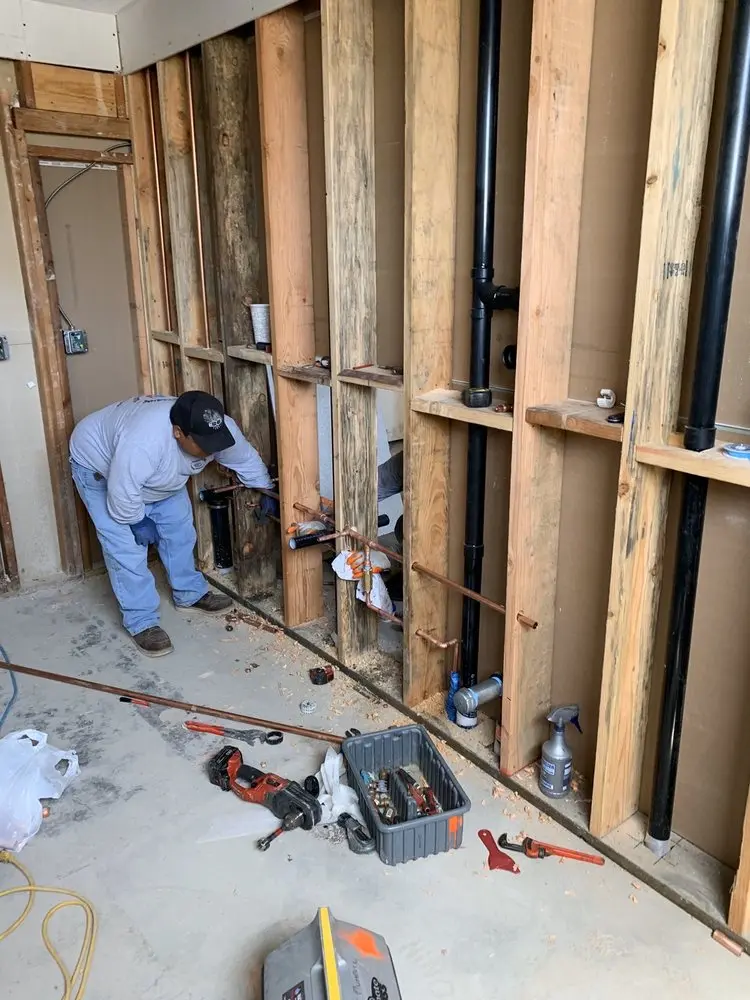 Commercial rough-in plumbing for Water Heater Replacement in Woodridge Twin Homes